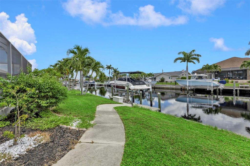 820 Bal Harbor Boulevard Punta Gorda, FL 33950 - Photo 25 of 56 a view of a backyard with sitting area