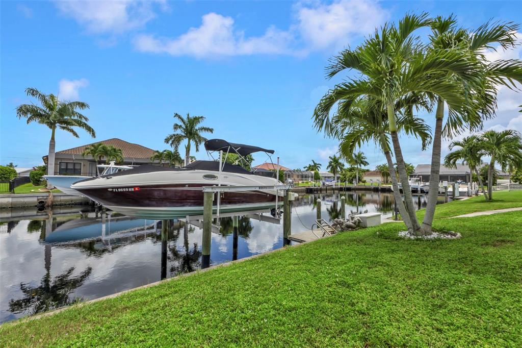 820 Bal Harbor Boulevard Punta Gorda, FL 33950 - Photo 27 of 56 a view of a backyard with a patio and swimming pool