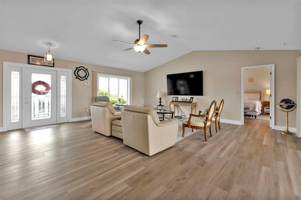 820 Bal Harbor Boulevard Punta Gorda, FL 33950 - Photo 31 of 56 a living room with furniture and a flat screen tv