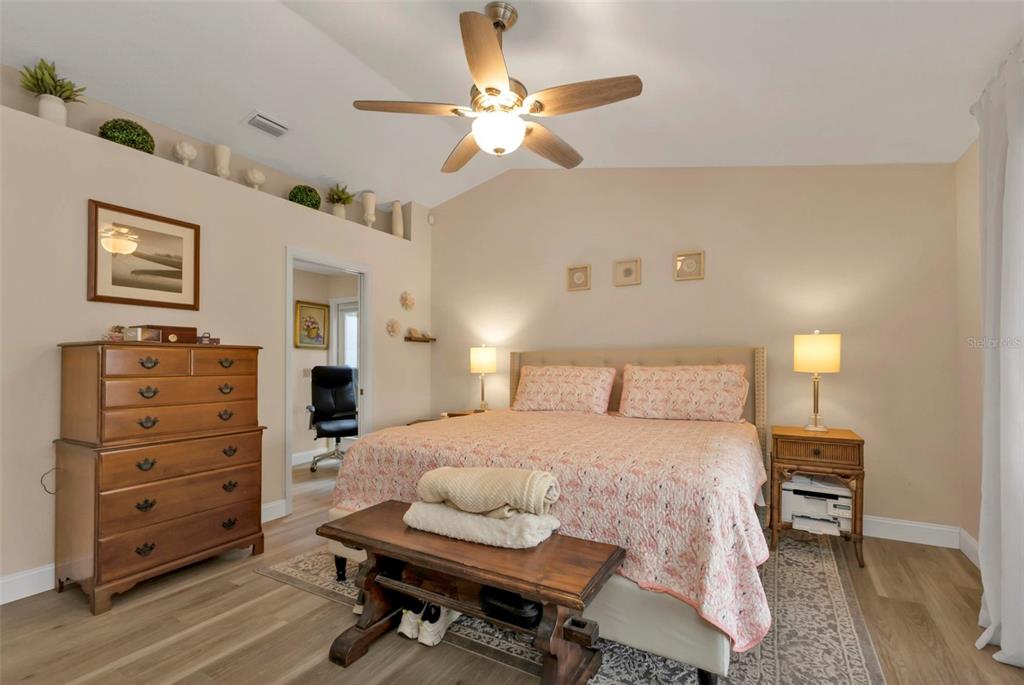 820 Bal Harbor Boulevard Punta Gorda, FL 33950 - Photo 35 of 56 a bedroom with a bed and furniture