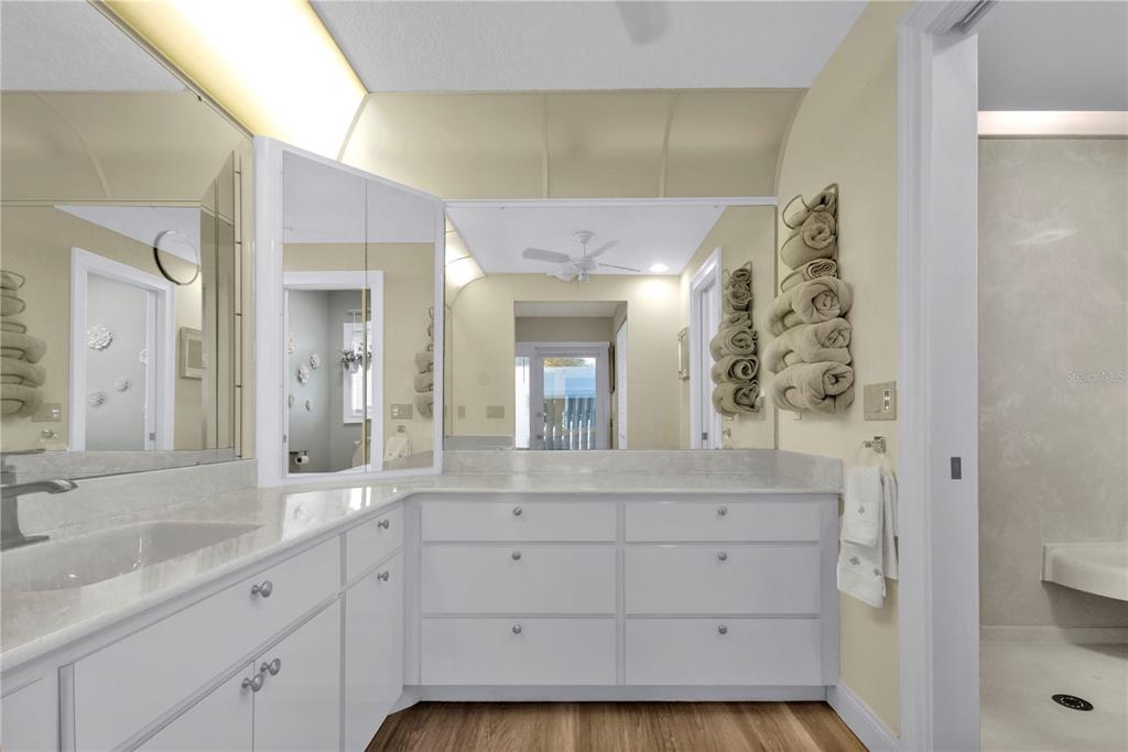 820 Bal Harbor Boulevard Punta Gorda, FL 33950 - Photo 39 of 56 a bathroom with a sink and a mirror