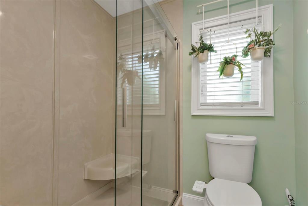 820 Bal Harbor Boulevard Punta Gorda, FL 33950 - Photo 40 of 56 a bathroom with a toilet and a shower