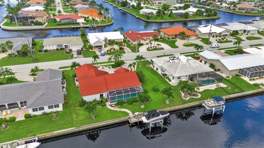 820 Bal Harbor Boulevard Punta Gorda, FL 33950 - Photo 9 of 56 an aerial view of a house with a yard basket ball court