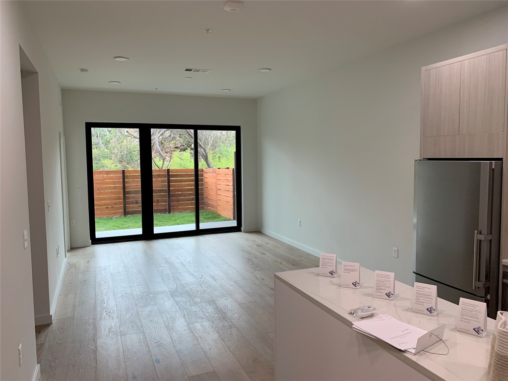 a bathroom with a sink and a large mirror