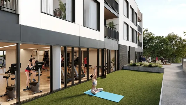 a view of a patio with a table and chairs