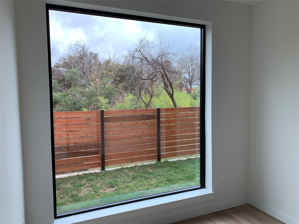 2209 South 1st Street, Unit 113 Austin, TX 78704 - Photo 5 of 16 a view of a pathway from a window