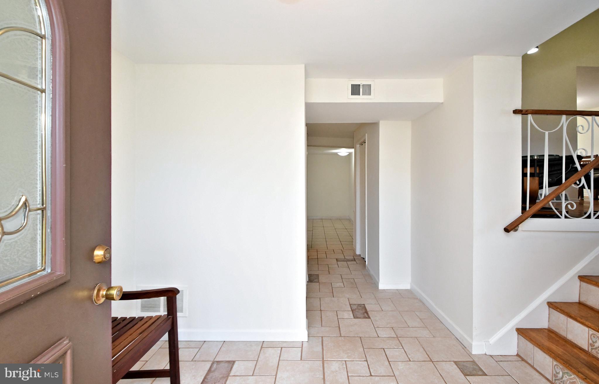 1024 Mueller Road Warminster, PA 18974 - Photo 3 of 34 Tiled foyer 16 ' x 9 '
