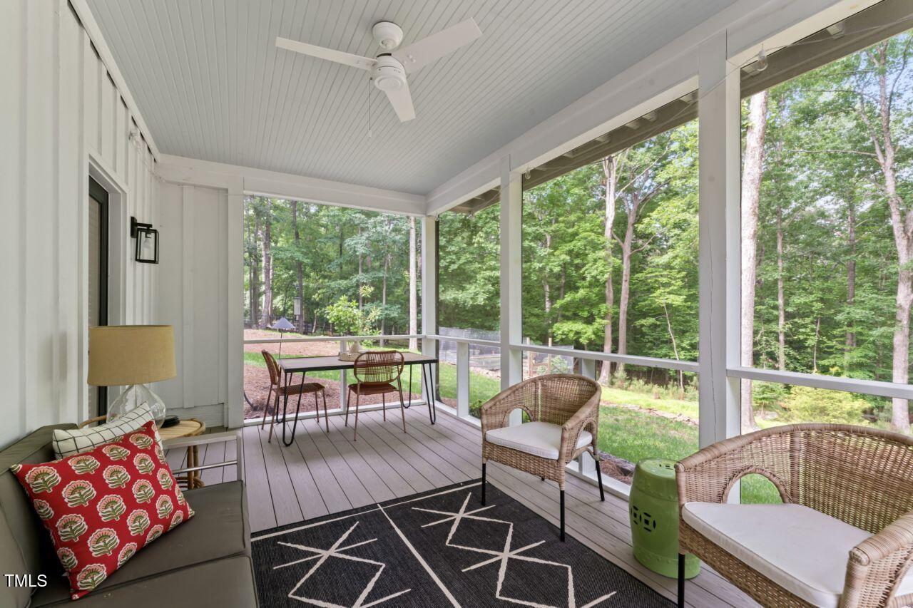 10817 Brass Kettle Road Raleigh, NC 27614 - Photo 43 of 55 a living room with furniture and a large window