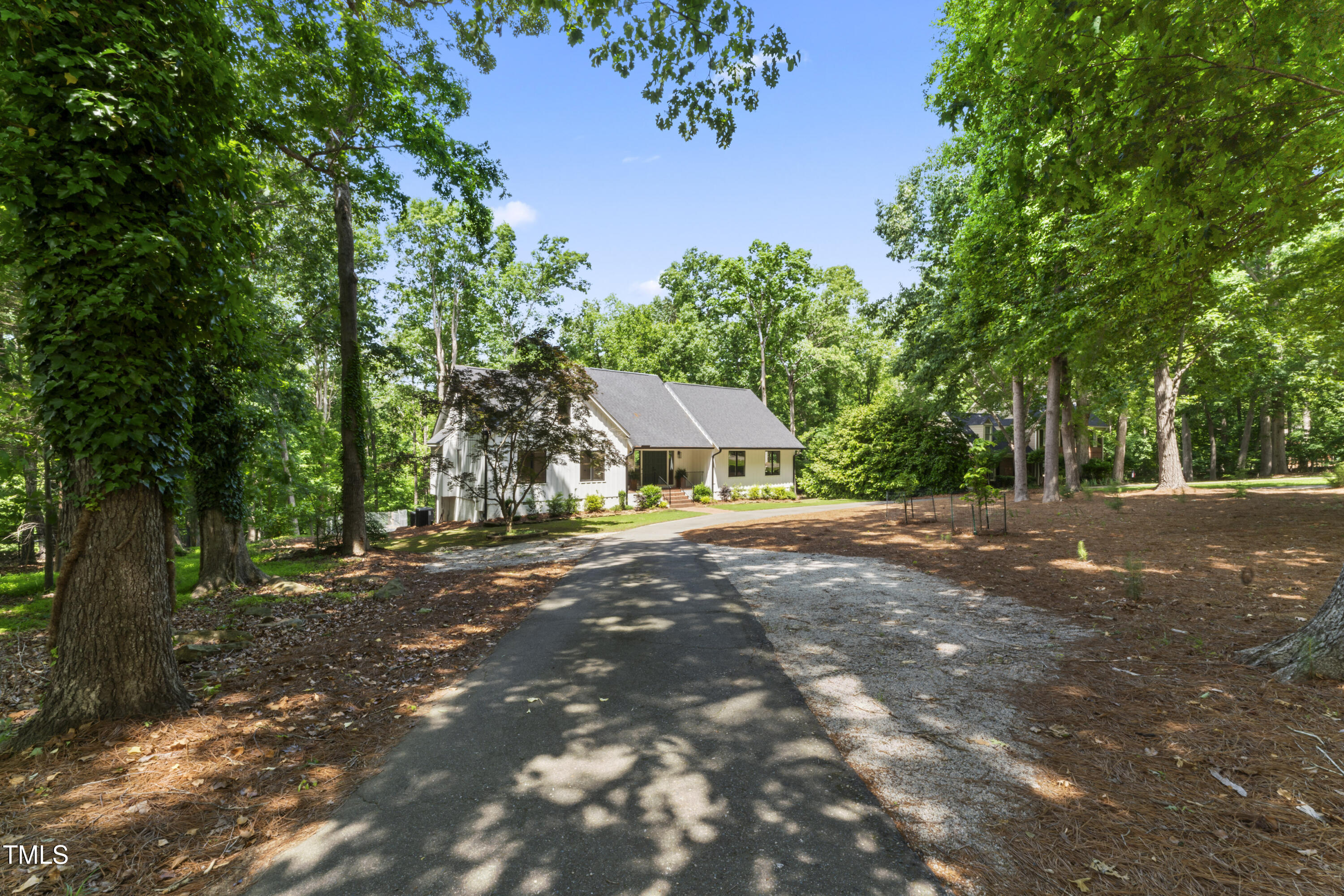 10817 Brass Kettle Road Raleigh, NC 27614 - Photo 5 of 55 a view of a street with a trees