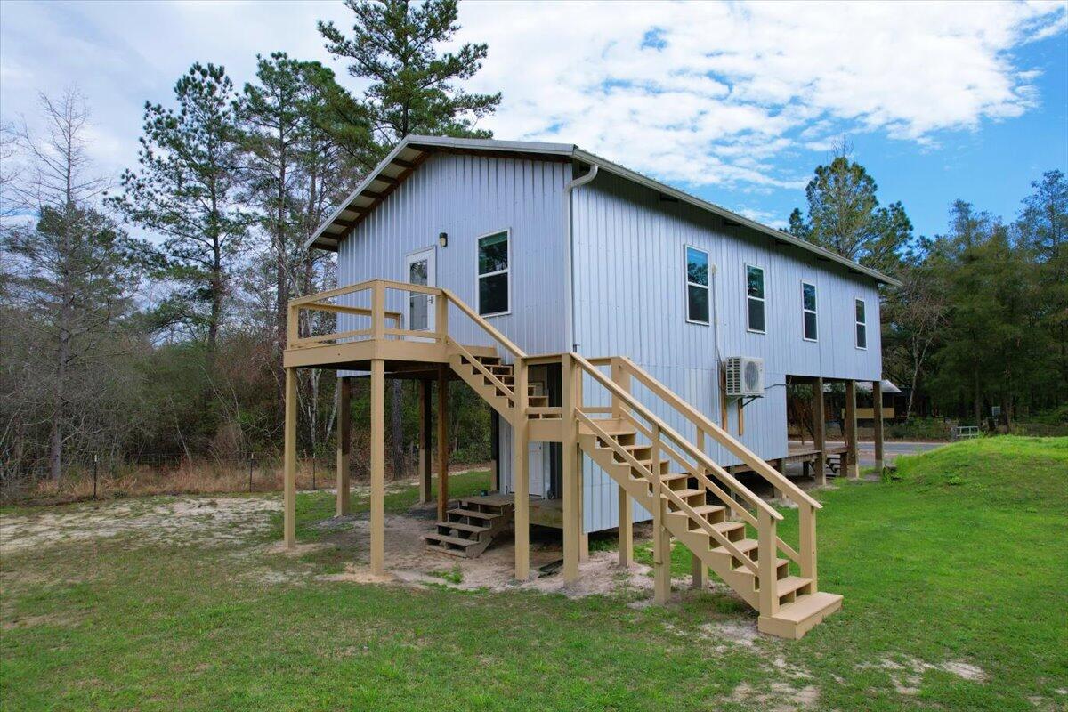 477 Canoe Lake Road Holt, FL 32564 - Photo 2 of 28 26-IMG_0346
