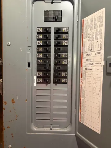 a bathroom with a bathtub and a window