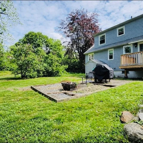 a house view with a garden space