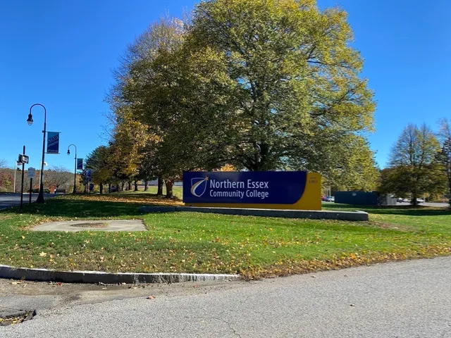 a sign board with a yard