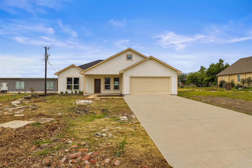7074 Northeast County Road Rice, TX 75155 - Photo 1 of 22 a view of a house with a yard