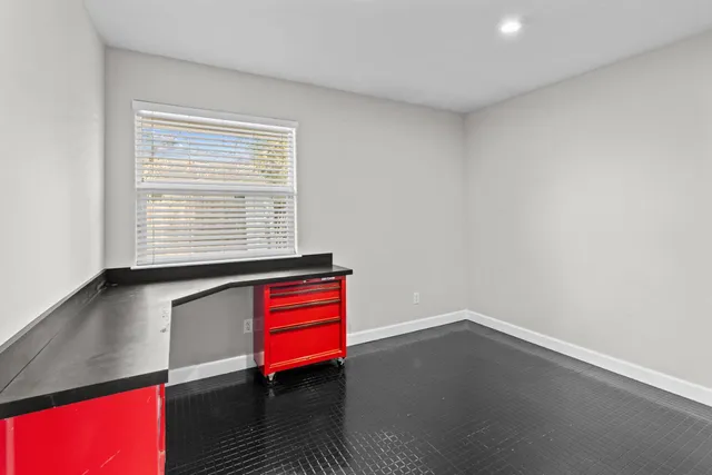 an empty room with windows