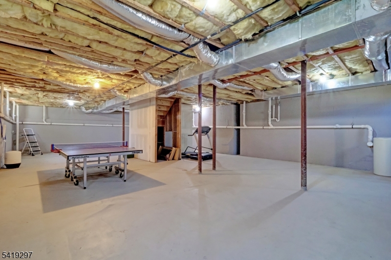 24 Pine Brook Road Montville, NJ 07082 - Photo 22 of 27 a view of a room with gym equipment