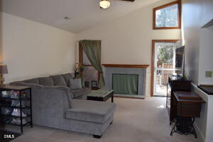 5500 Fortunes Ridge Drive, Unit 85C Durham, NC 27713 - Photo 47 of 50 a living room with furniture and a fireplace