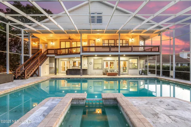 a view of a swimming pool with a patio