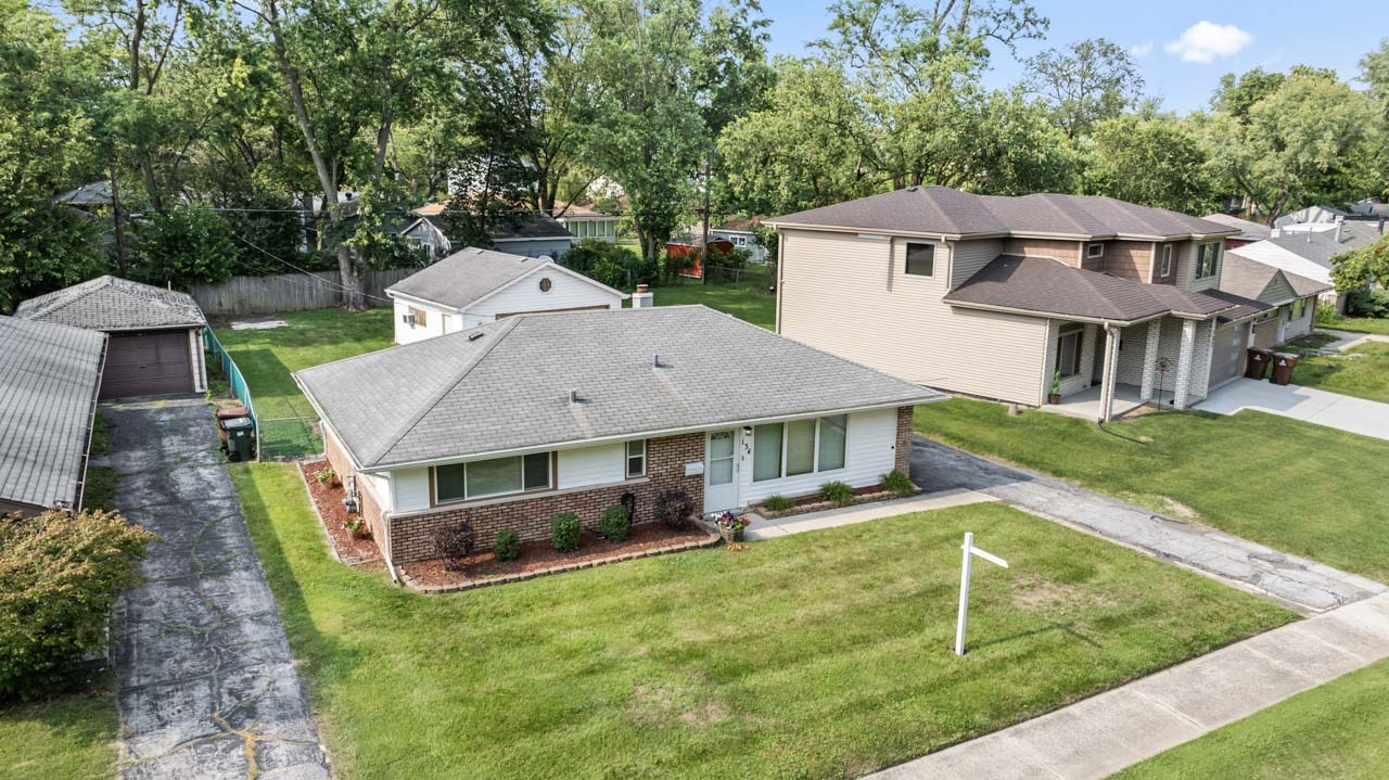 134 Monee Road Park Forest, IL 60466 - Photo 18 of 23 an aerial view of a house with swimming pool