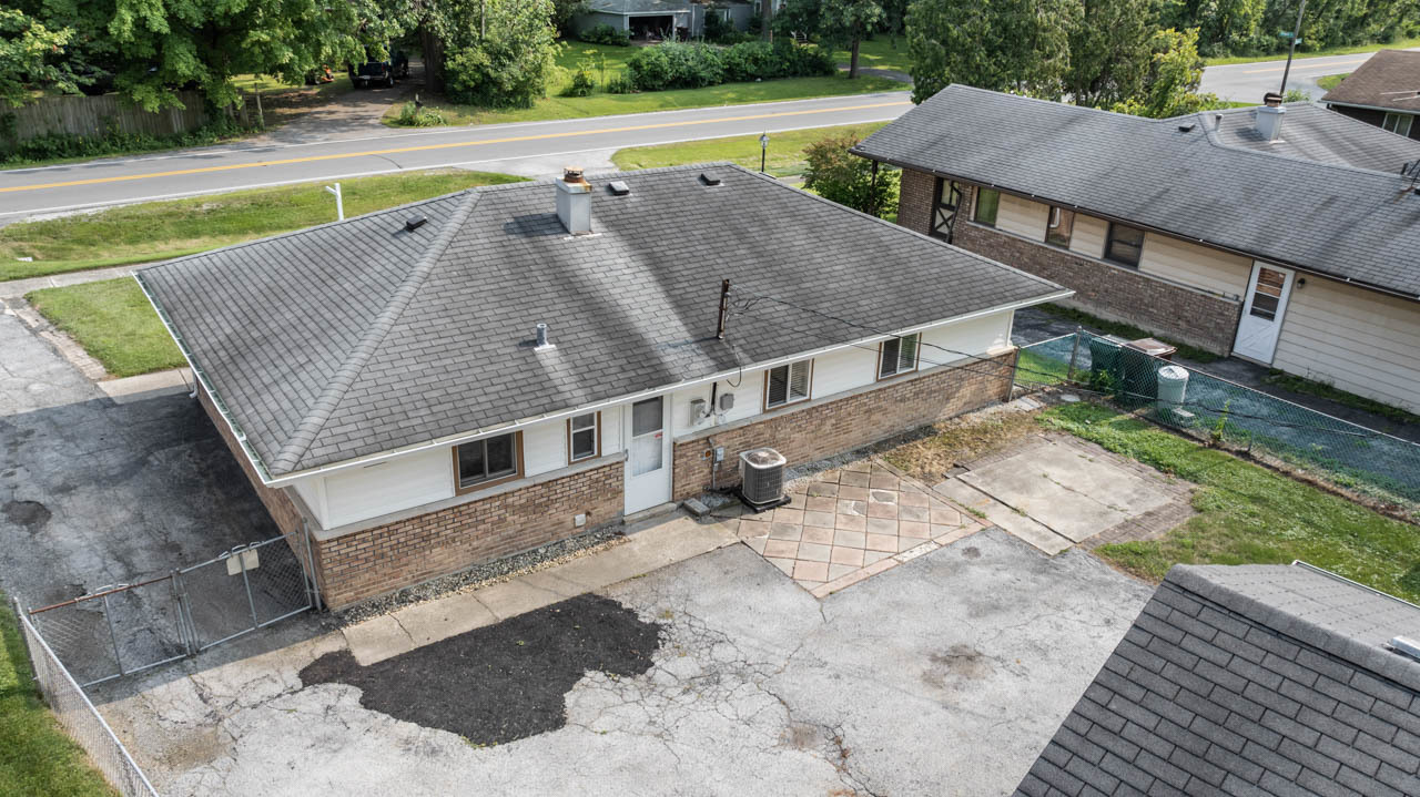 134 Monee Road Park Forest, IL 60466 - Photo 19 of 23 an aerial view of a house with a yard