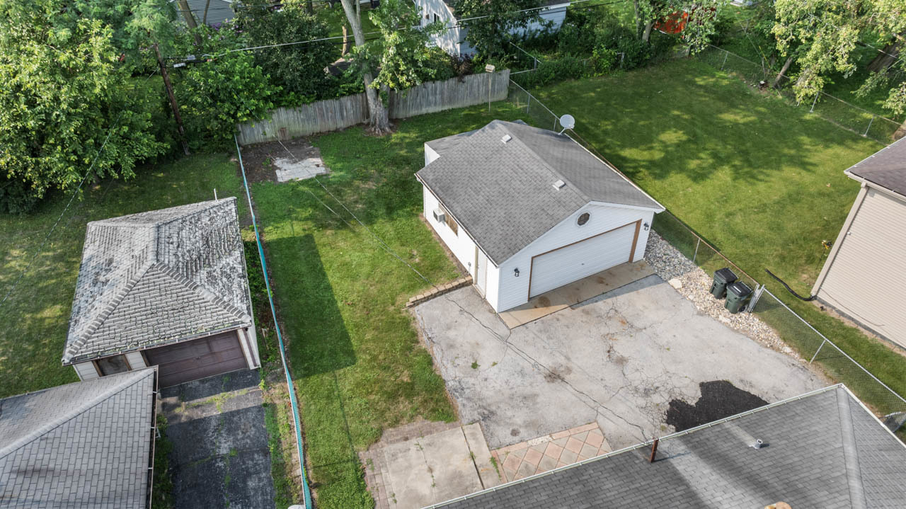 134 Monee Road Park Forest, IL 60466 - Photo 20 of 23 a aerial view of a house with a yard