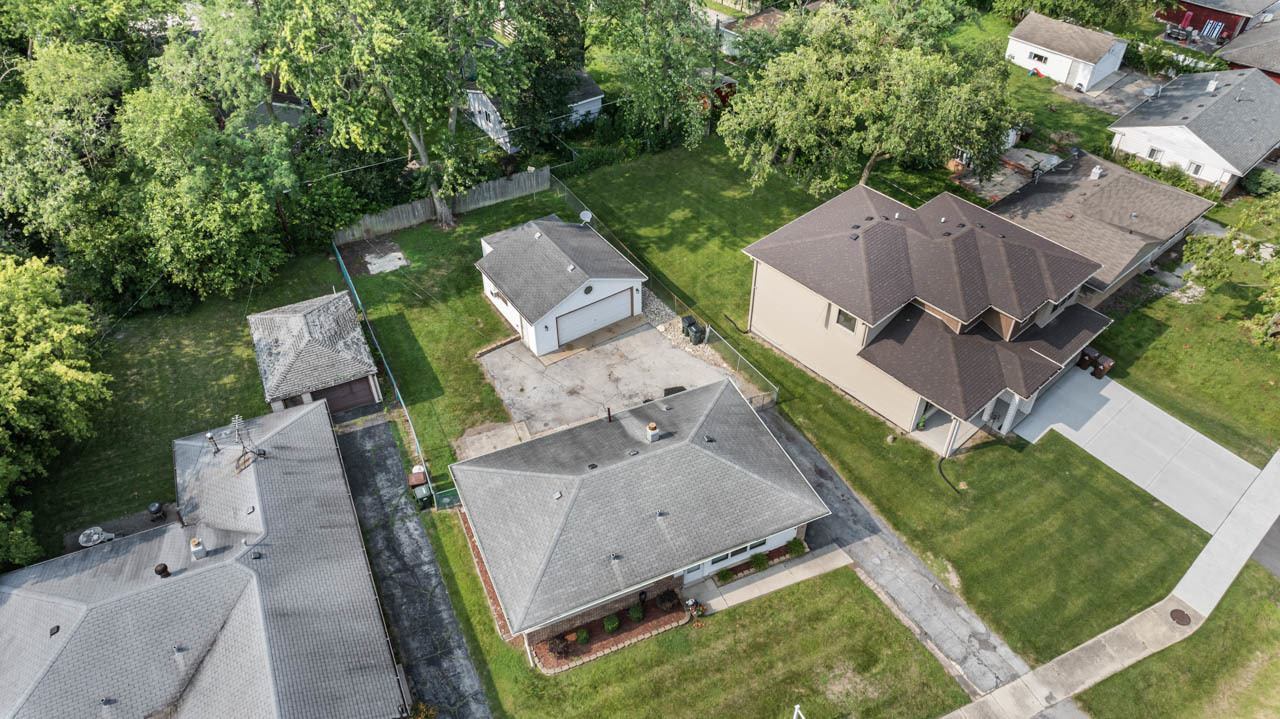 134 Monee Road Park Forest, IL 60466 - Photo 21 of 23 an aerial view of a house with garden space and street view