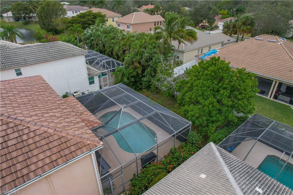 8271 Laurel Lakes Way Naples, FL 34119 - Photo 32 of 36 a aerial view of a house