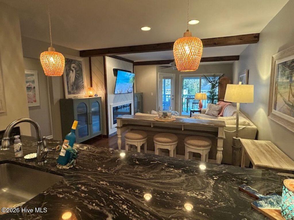 1914 Goose Creek Road Southwest, Unit 2204 Ocean Isle Beach, NC 28469 - Photo 11 of 43 open kitchen, dinning, family areas