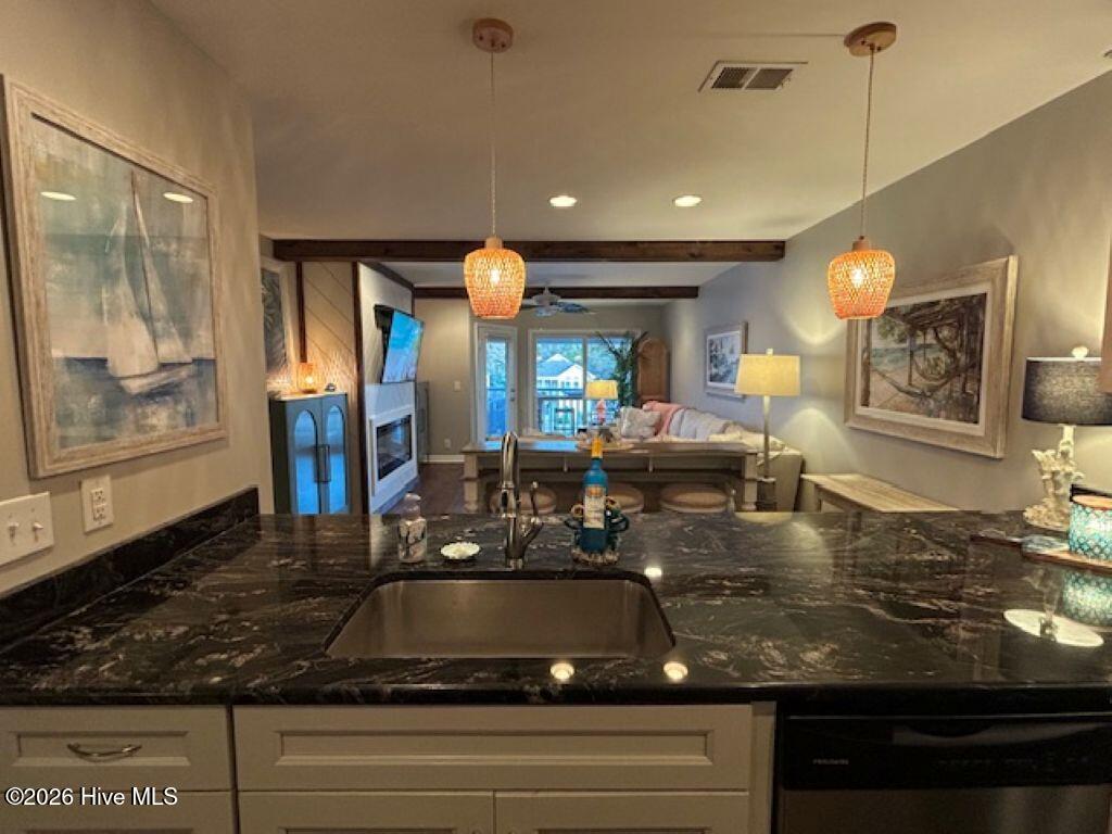 1914 Goose Creek Road Southwest, Unit 2204 Ocean Isle Beach, NC 28469 - Photo 12 of 43 open kitchen, dinning, family areas