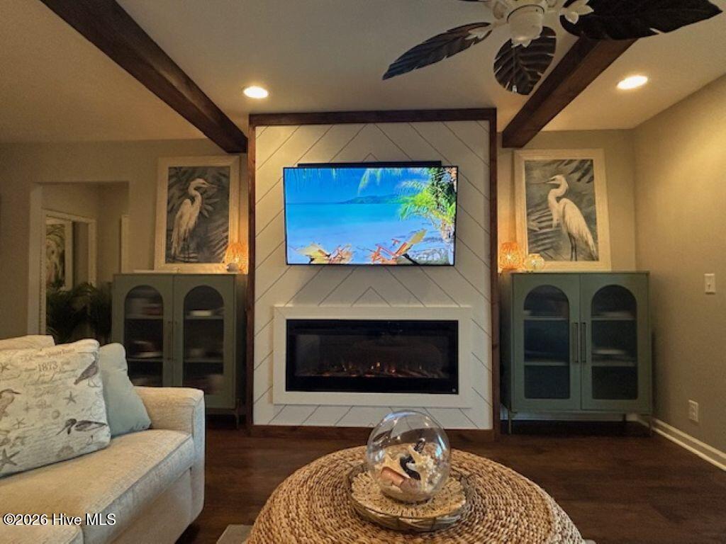 1914 Goose Creek Road Southwest, Unit 2204 Ocean Isle Beach, NC 28469 - Photo 6 of 33 family room, fireplace insert, beams