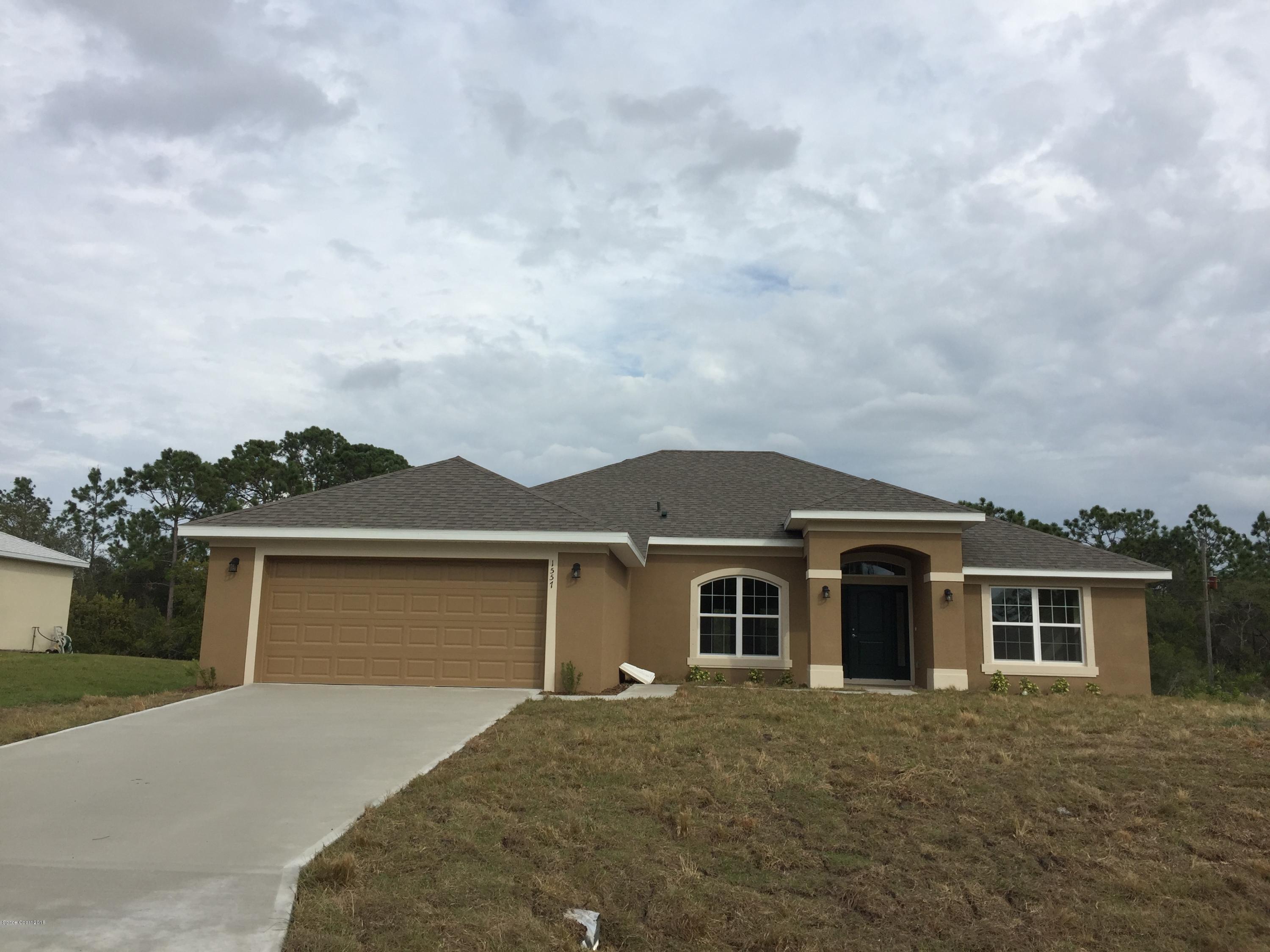 1557 Paragon Road Southeast Palm Bay, FL 32909 - Photo 1 of 18 Exterior Front Elevation