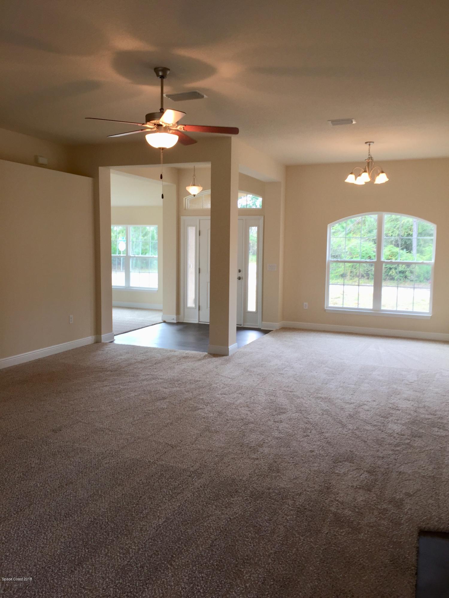 1557 Paragon Road Southeast Palm Bay, FL 32909 - Photo 7 of 18 Great Room