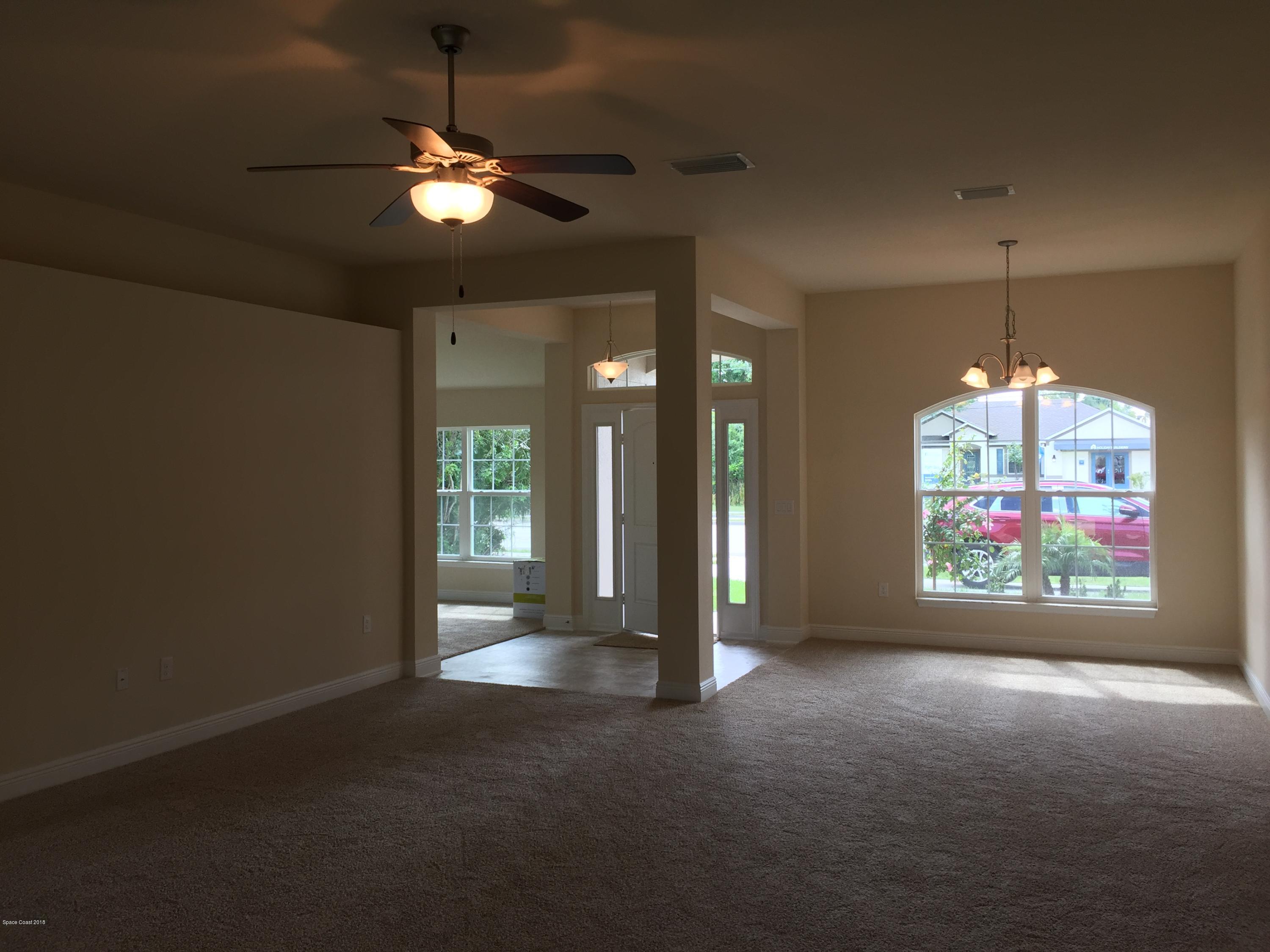 1557 Paragon Road Southeast Palm Bay, FL 32909 - Photo 8 of 18 Great room #2