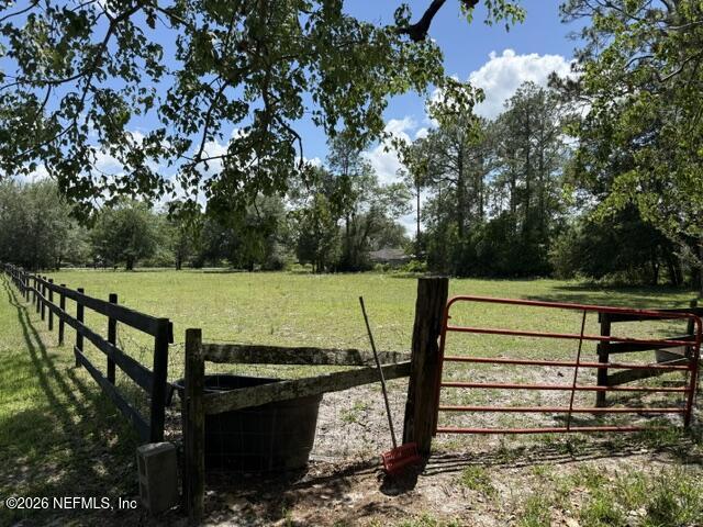 5214 Carter Spencer Road Middleburg, FL 32068 - Photo 13 of 50 a view of a bench with wooden floor