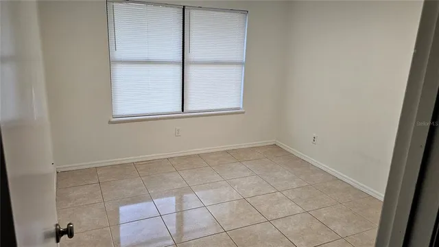 an empty room with cabinet