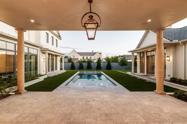 a view of swimming pool with yard