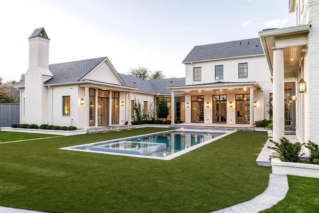 a view of a house with a swimming pool