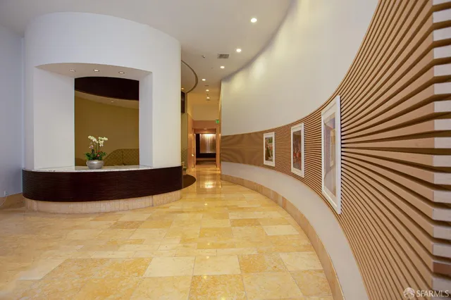 a view of swimming pool with a hallway