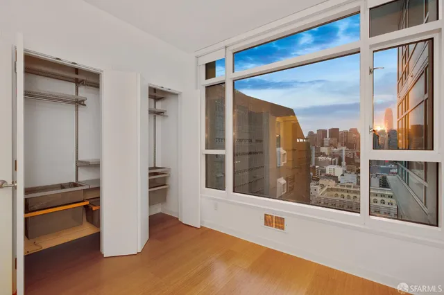 a view of a living room with a large window