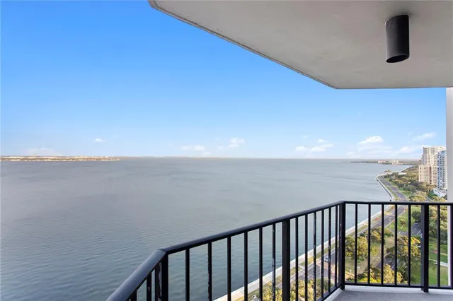 a kitchen with a sink and stainless steel appliances