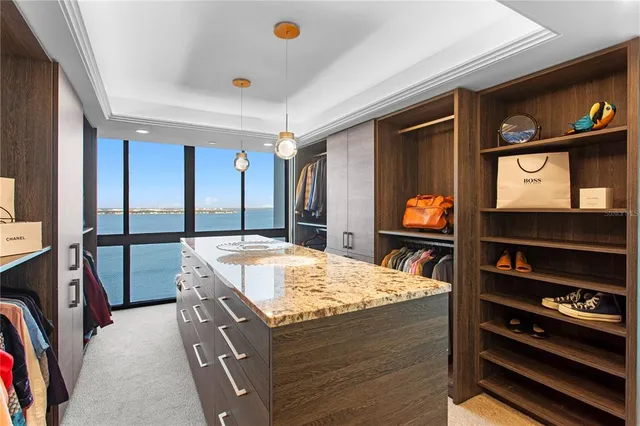 a kitchen with stainless steel appliances granite countertop a stove and a sink