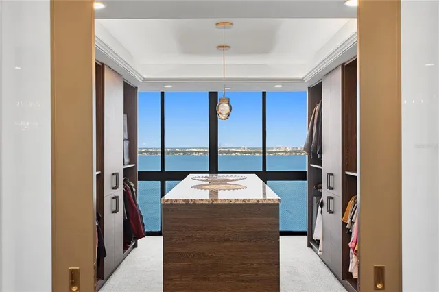 a kitchen with a refrigerator and a stove