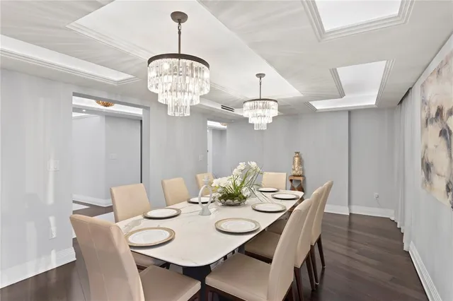 a bedroom with a large window and a bed