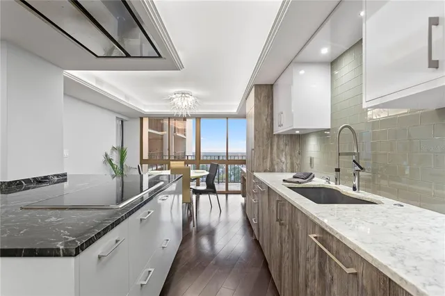 a bed room with a bed and a television