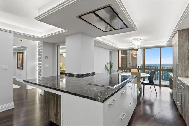 a view of a living room and windows