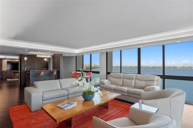 a view of swimming pool with outdoor seating