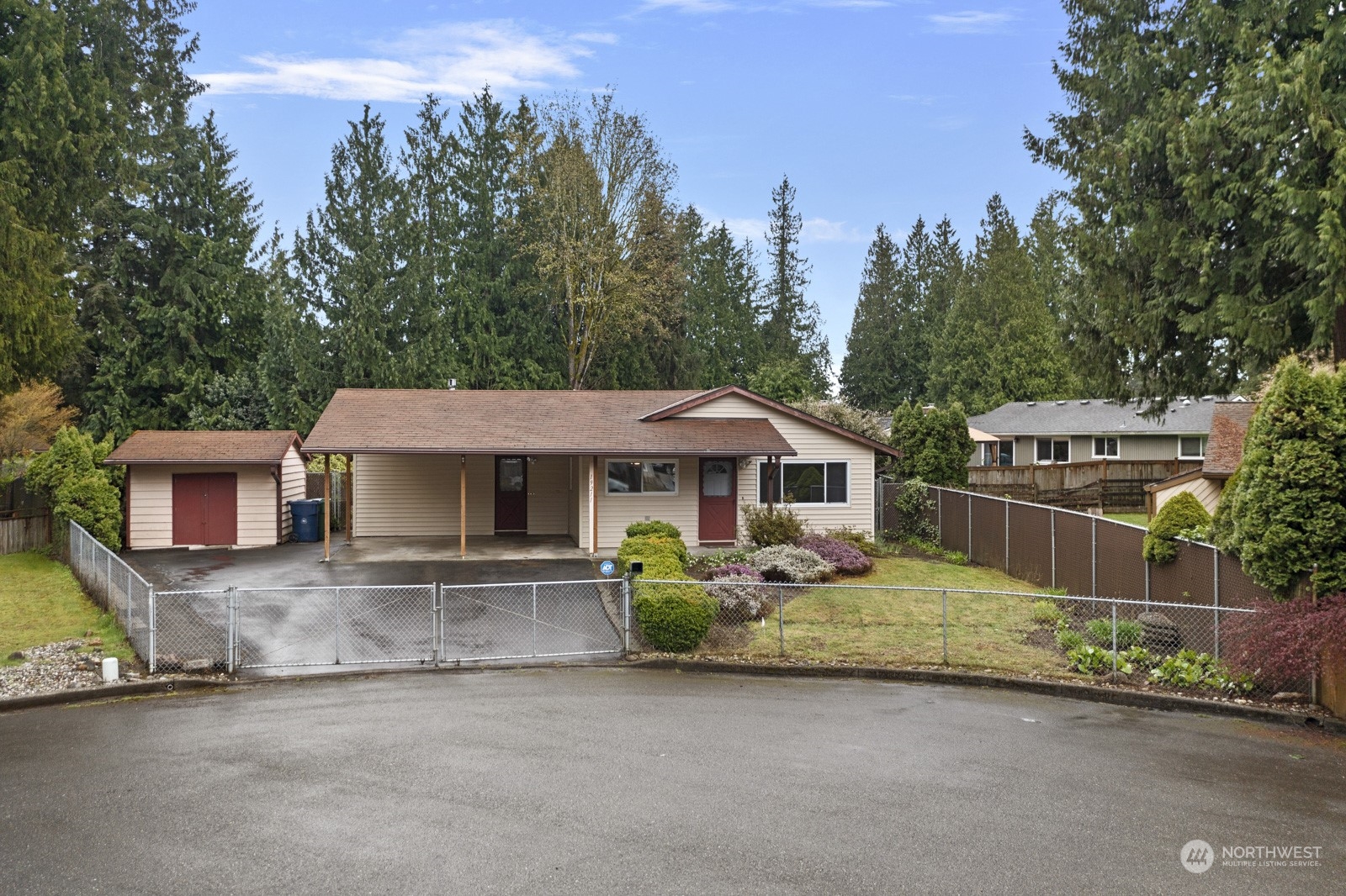 19211 3rd Drive Southeast Bothell, WA 98012 - Photo 2 of 37 an outdoor view of house with yard and trees in the background