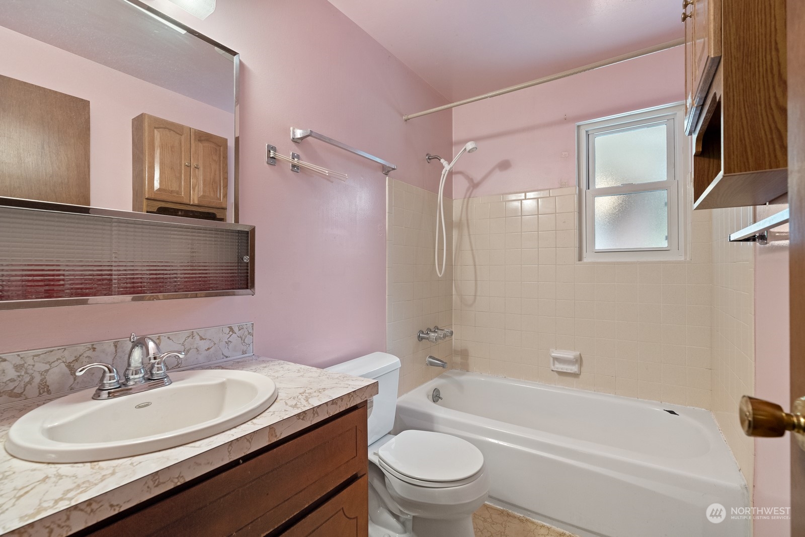19211 3rd Drive Southeast Bothell, WA 98012 - Photo 21 of 37 a bathroom with a sink toilet tub and shower