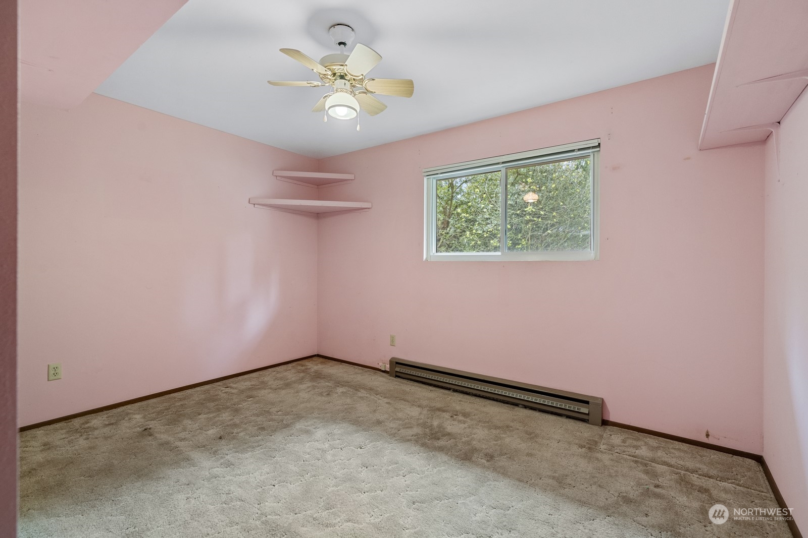 19211 3rd Drive Southeast Bothell, WA 98012 - Photo 22 of 37 an empty room with a chandelier fan