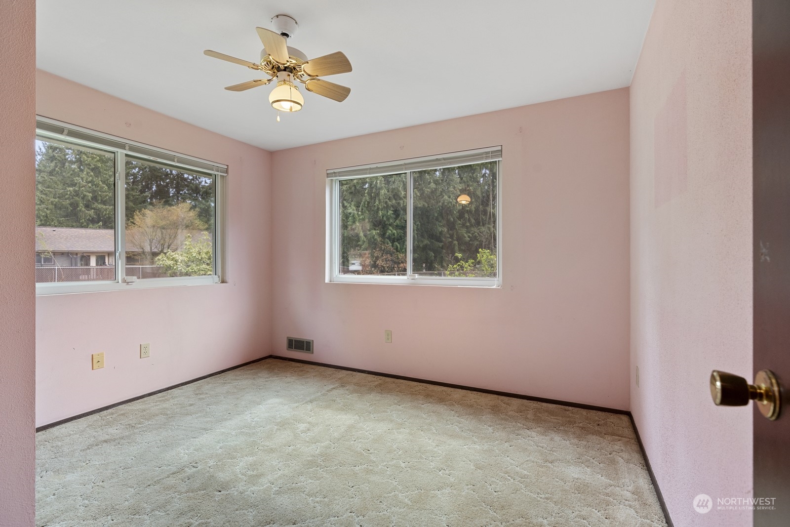 19211 3rd Drive Southeast Bothell, WA 98012 - Photo 28 of 37 an empty room with windows and fan